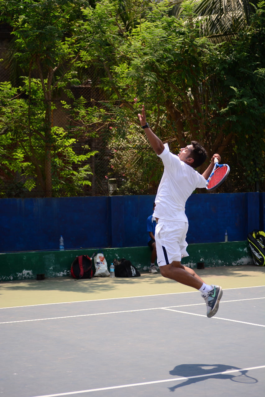 Farid Alam demonstrating the perfect serve posture